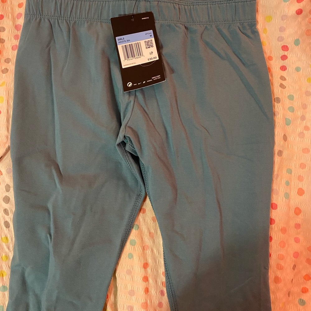 BNWT teal Nike leggings